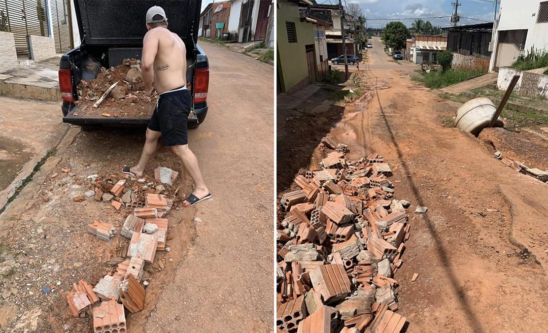 Moradores tapam buracos com concreto em rua intrafegável no Nova Esperança, em Rio Branco