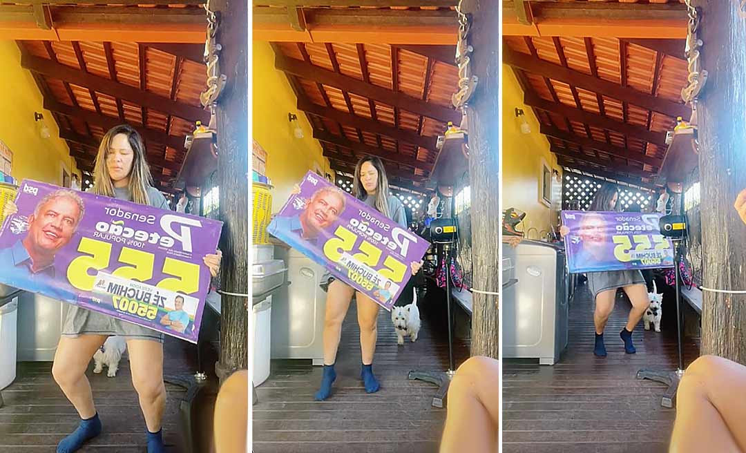Abraçada com placa de Petecão, Marfisa dança "oh, mulher, que me deixa na ponta do pé"