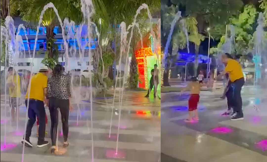 Bocalom e sua esposa Kellen tomam banho na fonte da Praça da Revolução na última noite das luzes de Natal da prefeitura